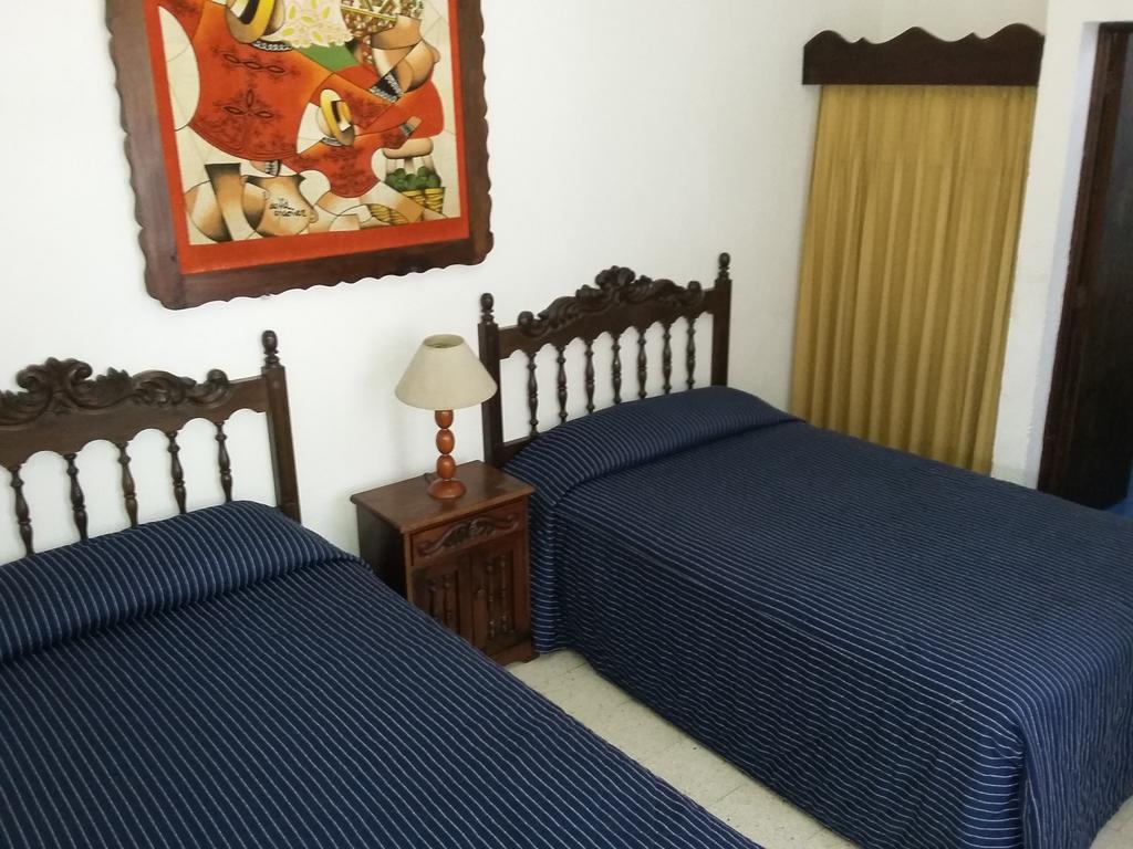 Hotel Santa Clara Antigua Quarto foto